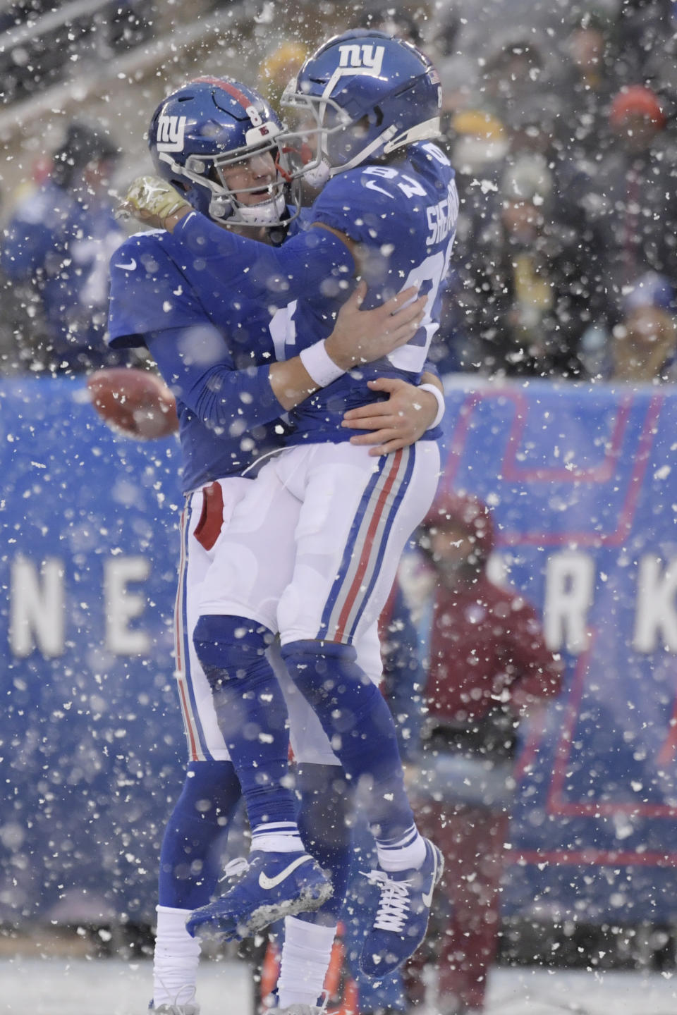 New York Giants quarterback Daniel Jones, left, celebrates with Sterling Shepard after a touchdown during the first half of an NFL football game against the Green Bay Packers, Sunday, Dec. 1, 2019, in East Rutherford, N.J. (AP Photo/Bill Kostroun)