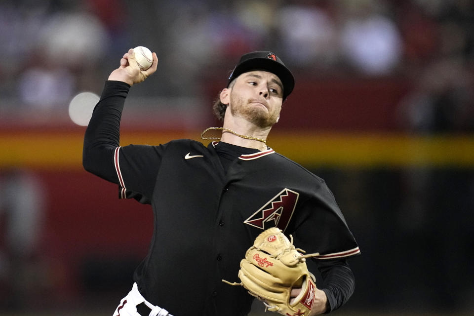 Arizona Diamondbacks starting pitcher Ryne Nelson throws against the St. Louis Cardinals during the first inning of a baseball game Monday, July 24, 2023, in Phoenix. (AP Photo/Ross D. Franklin)