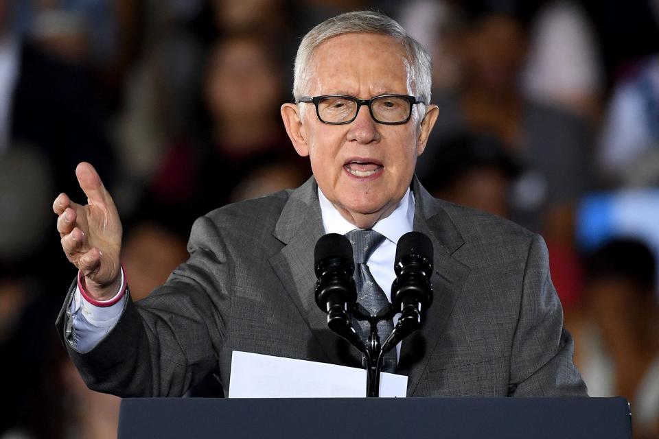 NORTH LAS VEGAS, NV - OCTOBER 23: U.S. Senate Minority Leader Harry Reid (D-NV) speaks at a campaign rally with U.S. President Barack Obama for Democratic presidential nominee Hillary Clinton at Cheyenne High School on October 23, 2016 in North Las Vegas, Nevada. Obama urged Nevadans to vote early one day after a record-breaking start to early voting in the swing state with almost 40,000 people going to the polls ahead of the November 8 general election. (Photo by Ethan Miller/Getty Images)