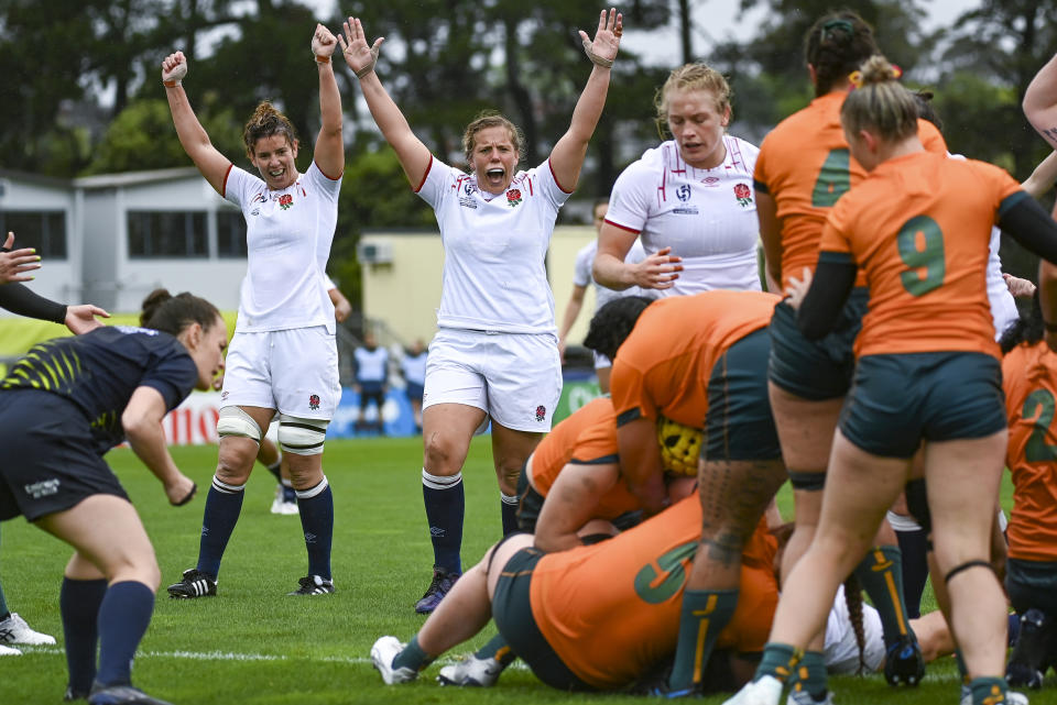 England players celebrate a try during the women's rugby World Cup quarterfinal against Australia at Waitakere Stadium in Auckland, New Zealand, Sunday Oct. 30 2022. (Andrew Cornaga/Photosport via AP)