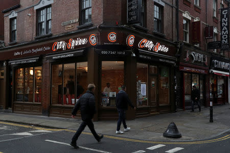 Pedestrians pass the City Spice curry house restaurant on Brick Lane in London, Britain January 7, 2019. Picture taken January 7, 2019. REUTERS/Simon Dawson