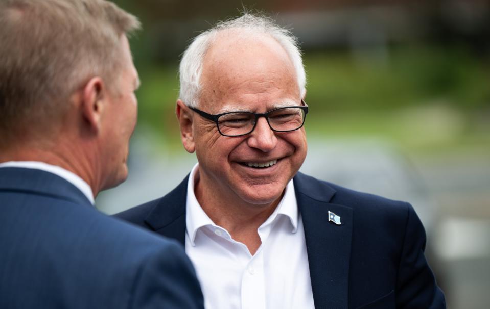 Minnesota Governor Tim Walz arrives to speak at a press conference regarding new gun legislation at City Hall on August 1, 2024