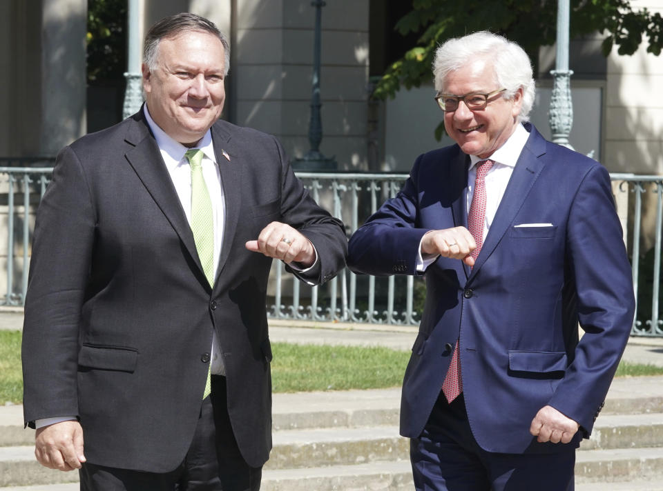 US Secretary of State Mike Pompeo, left, meets with Poland's Foreign Minister Jacek Czaputowicz in Lazienki Palace in Warsaw, Poland, Saturday Aug. 15, 2020. Pompeo is on a five day visit to central Europe. (Janek Skarzynski/Pool via AP)