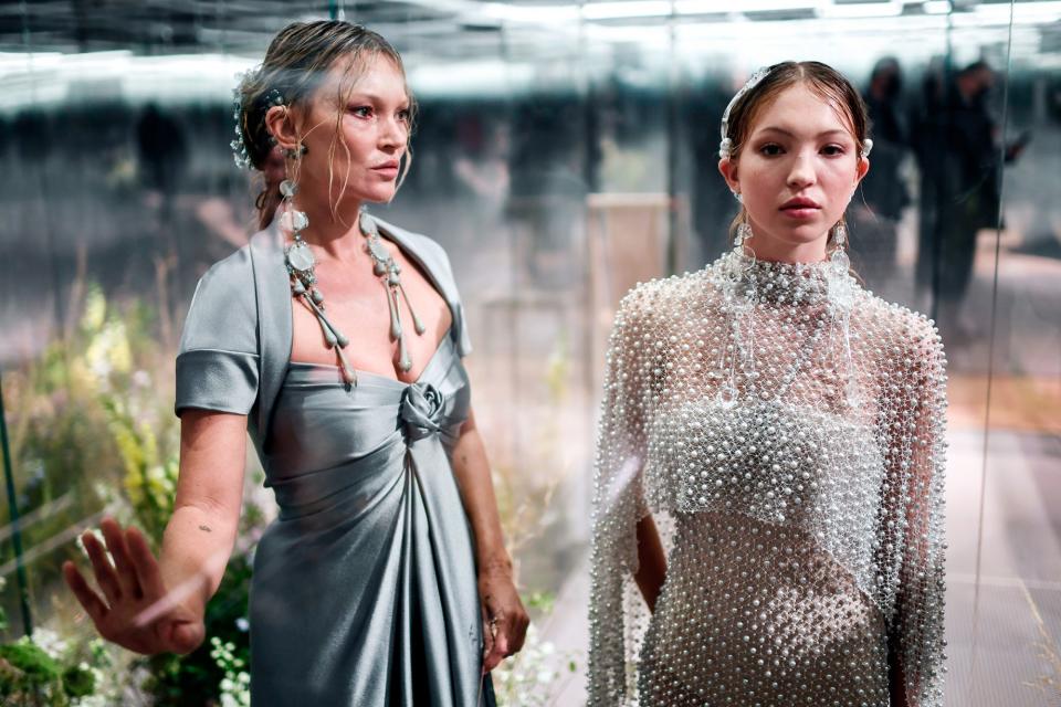 <p>Kate Moss and daughter Lila Grace showcase British designer Kim Jones' looks during Fendi's spring/summer 2021 presentation at Paris Haute Couture Fashion Week on Wednesday.</p>