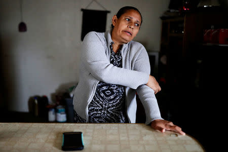 Sandra Gutierrez, who fled from gang violence in Honduras with her family and was granted asylum by the United States in 2016, stands at her home in Oakland, California, U.S., May 30, 2017. Picture taken May 30, 2017. REUTERS/Stephen Lam