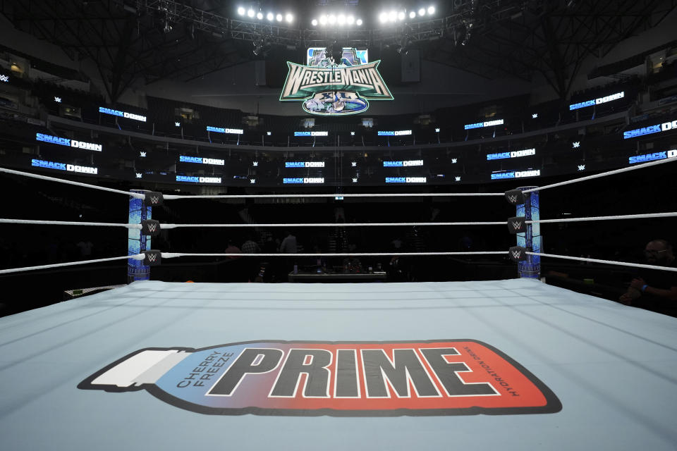This photo provided by the WWE shows a wrestling mat with the Prime logo featured prominently. WWE has struck a deal with YouTube stars Logan Paul and KSI’s beverage brand Prime that will see its logo featured on the center of a WWE wrestling ring mat. It's a first for the sports entertainment company. (Courtesy of WWE via AP)