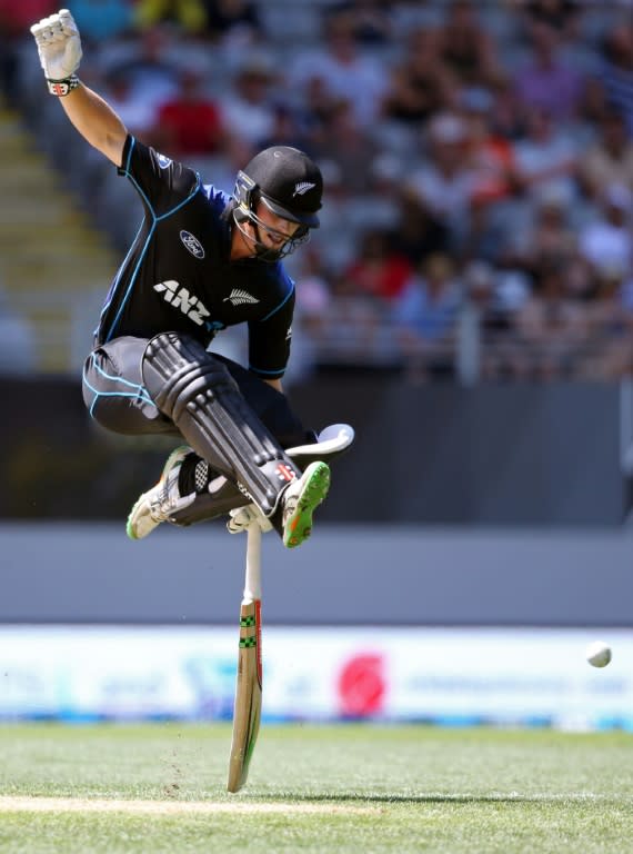 Henry Nicholls of New Zealand jumps over the ball during their first ODI match against Australia, at Eden Park in Auckland, on February 3, 2016