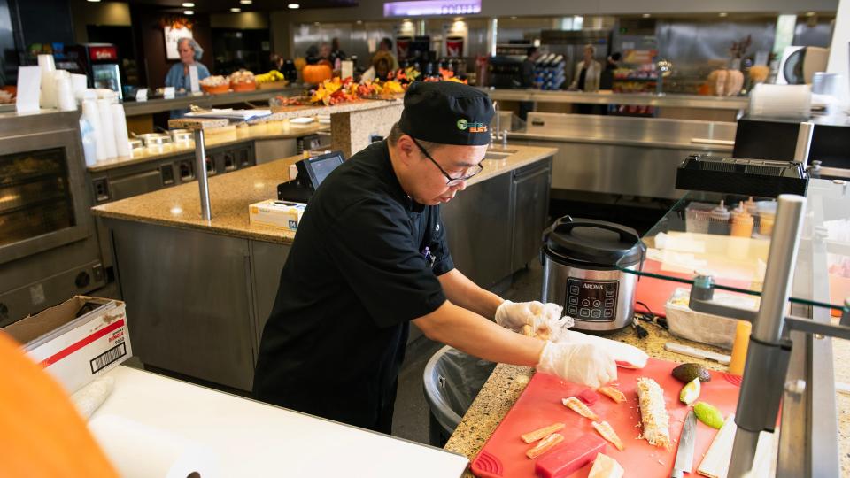 Sushi chef Josef Sutiono creates a sushi roll in the cafeteria of Virtua Voorhees Hospital.