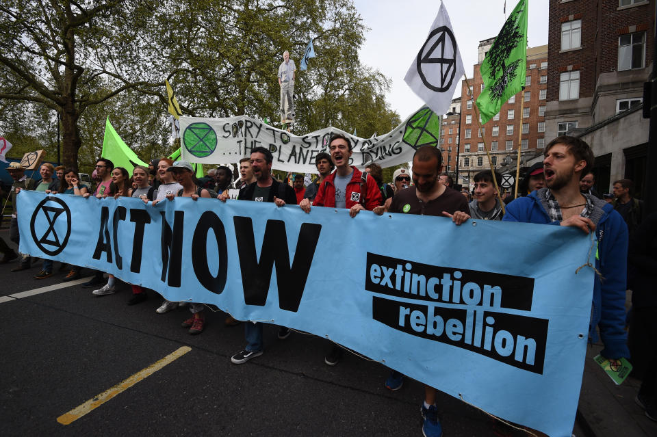 Extinction Rebellion protesters march from their camp in Marble Arch down Park Lane in London. More than 1,000 people have been arrested during the climate change protests in London as police cleared the roadblocks responsible for disruption in the capital.