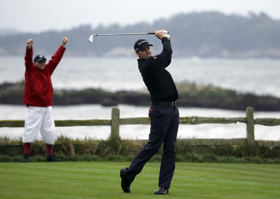 Jimmy Walker hits off the 18th tee, Sunday, Feb. 9, 2014, during the final round of the AT&T Pebble Beach Pro-Am golf tournament in Pebble Beach, Calif. (AP Photo/Ben Margot)