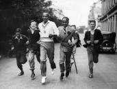 <p>Owens was a track-and-field athlete who <a href="http://time.com/3971065/photos-1936-summer-olympics-jesse-owens/" rel="nofollow noopener" target="_blank" data-ylk="slk:set a world record;elm:context_link;itc:0;sec:content-canvas" class="link ">set a world record</a> in the long jump at the 1936 Olympic Games in Berlin—and went unrivaled for 25 years. He won four gold medals at the Olympics that year in the 100- and 200-meter dashes, along with the 100-meter relay and other events off the track. In 1976, Owens received the Presidential Medal of Freedom and was posthumously awarded the Congressional Gold Medal in 1990.</p>