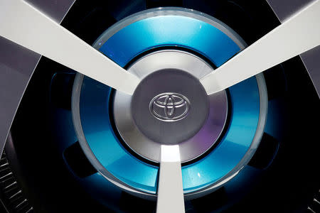 FILE PHOTO: View of a Toyota logo on a wheel at the Mondial de l'Automobile, Paris auto show, during media day in Paris, France, September 30, 2016. REUTERS/Jacky Naegelen/File Photo