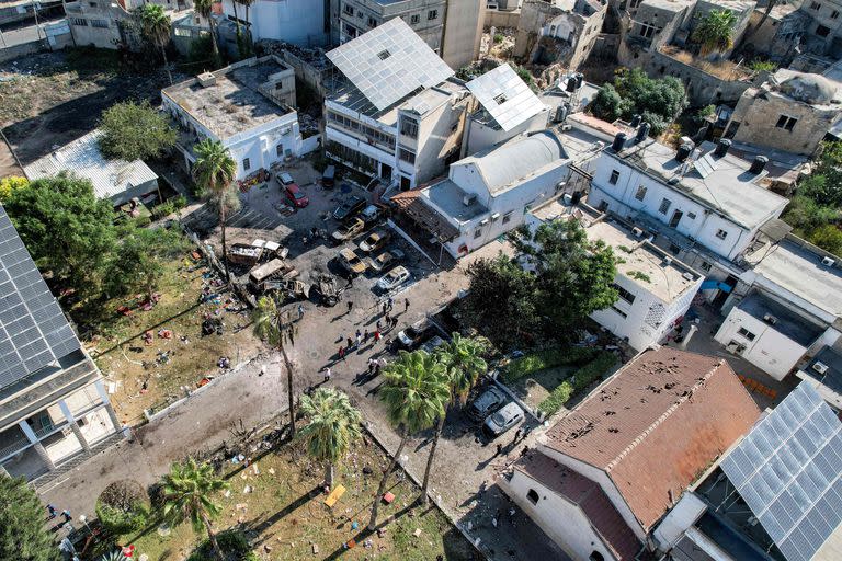 This picture taken on October 18, 2023 shows an aerial view of the complex housing the Ahli Arab hospital in Gaza City in the aftermath of an overnight blast. A blast ripped through a hospital in war-torn Gaza killing hundreds of people late on October 17, sparking global condemnation and angry protests around the Muslim world. Israel and Palestinians traded blame for the incident, which an 