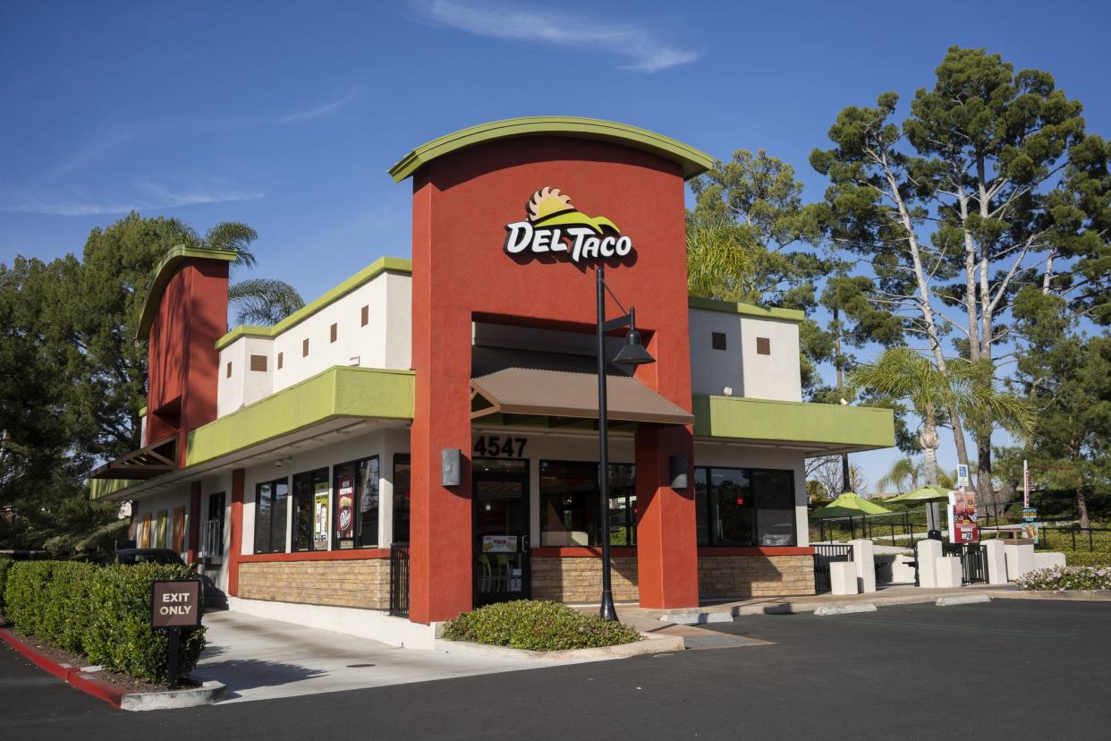 Irvine, CA, USA - Mar 25, 2022: Exterior view of a Del Taco restaurant in Irvine, California. Del Taco Restaurants, Inc. is an American fast food restaurant chain based in Lake Forest, California.