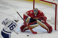 Toronto Maple Leafs right wing Mitch Marner (16) attempts a shot at Florida Panthers goaltender Anthony Stolarz (41) during the first period of an NHL hockey game, Tuesday, April 16, 2024, in Sunrise, Fla. (AP Photo/Wilfredo Lee)