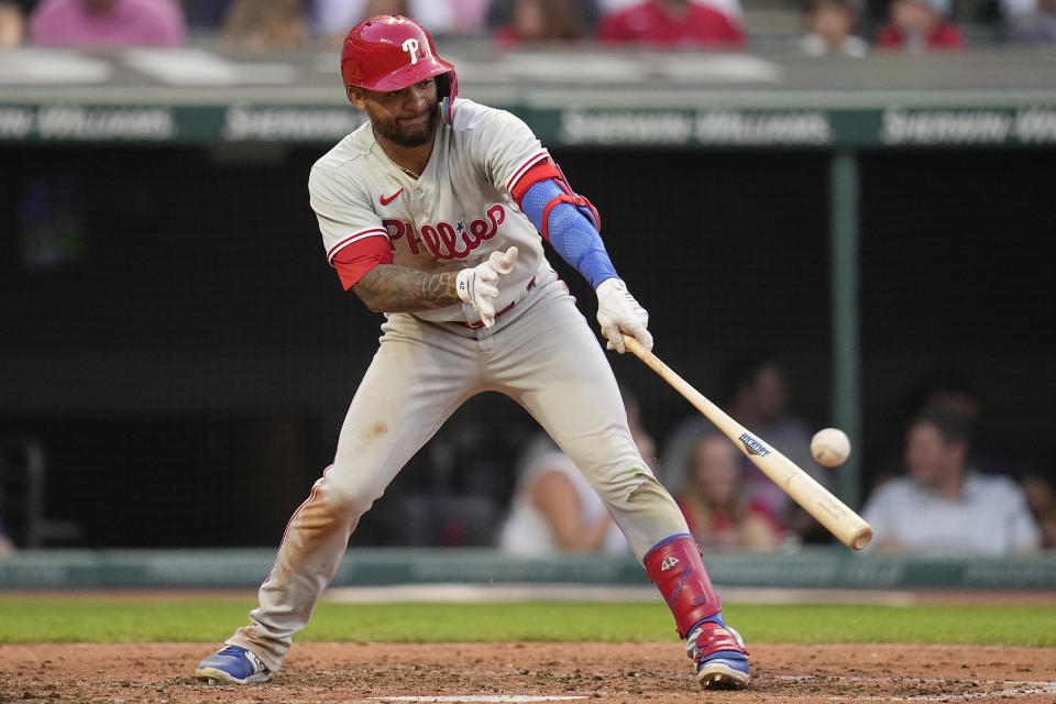Philadelphia Phillies' Edmundo Sosa doubles in the sixth inning of a baseball game against the Cleveland Guardians, Saturday, July 22, 2023, in Cleveland. (AP Photo/Sue Ogrocki)