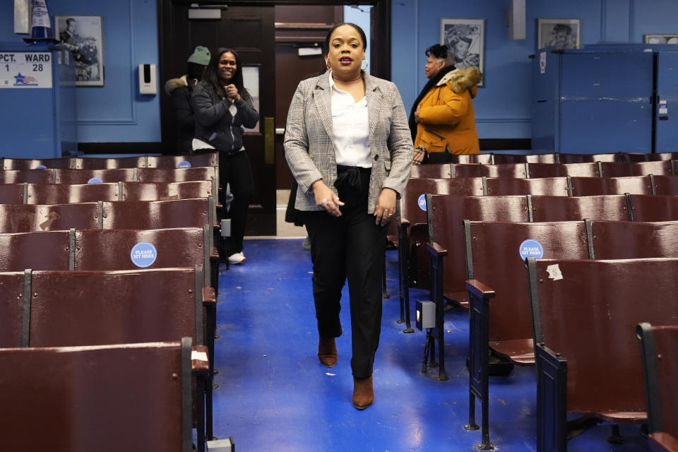 Democratic candidate Kina Collins who runs for Congress in the 7th District, walks into Spencer Elementary Technology Academy for voting in Chicago, Tuesday, March 19, 2024. Illinois residents will vote Tuesday to narrow Democratic and GOP candidate fields in key U.S. House races. (AP Photo/Nam Y. Huh)