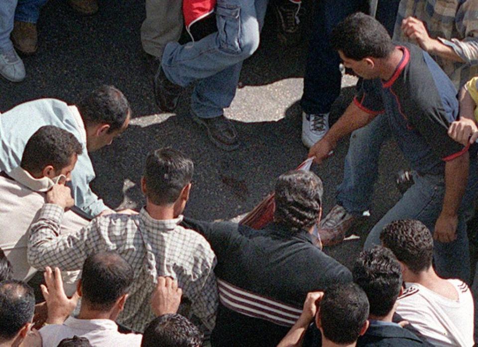 According to Rory Lancman, senior counsel to the Brandeis Center for Human Rights Under Law, the red handprints are an attempt to “terrorize” Jews with a reference to the Ramallah Lynching of 2000 in the West Bank. Photo by CHRIS GERALD/AFP via Getty Images