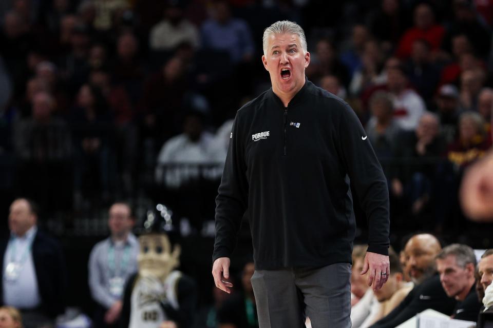 Purdue Boilermakers head coach Matt Painter reacts during the overtime against the Purdue Boilermakers at Target Center.