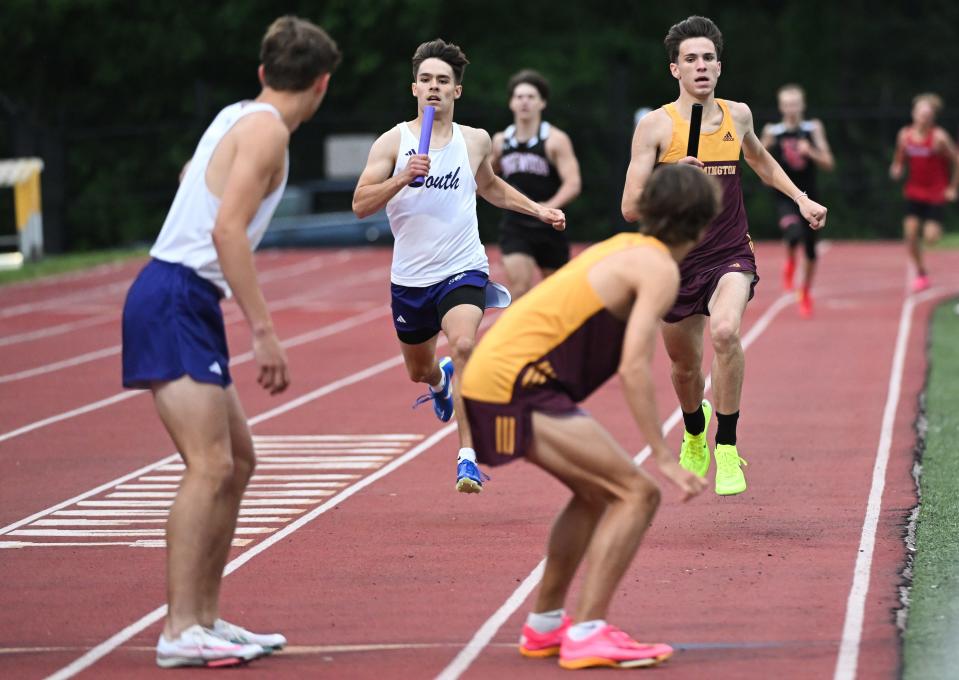Bloomington South’s Adrian Rheam and Bloomington North’s Caelan D'Onofrio approach Josh Tait and Caleb Winders for the final handoff in the 1,600 meter relay during the IHSAA boys’ track and field sectional championship at Bloomington North on Thursday, May 16, 2024.