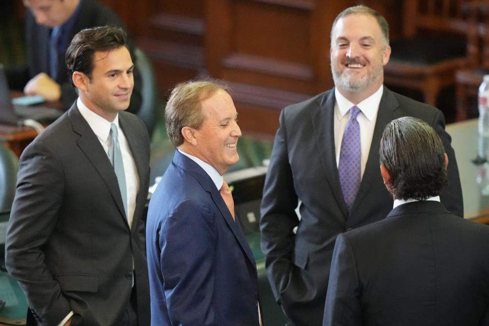 Attorney General Ken Paxton, arriving on the Senate floor for his impeachment trial Sept. 5, was acquitted of those charges and last week made a deal in his securities fraud case.
