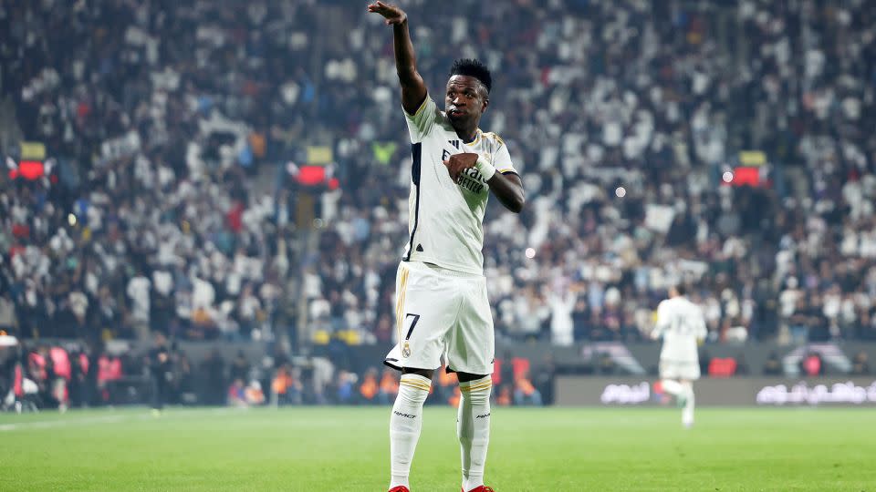 Vinícius celebrates after opening the scoring. - Yasser Bakhsh/Getty Images