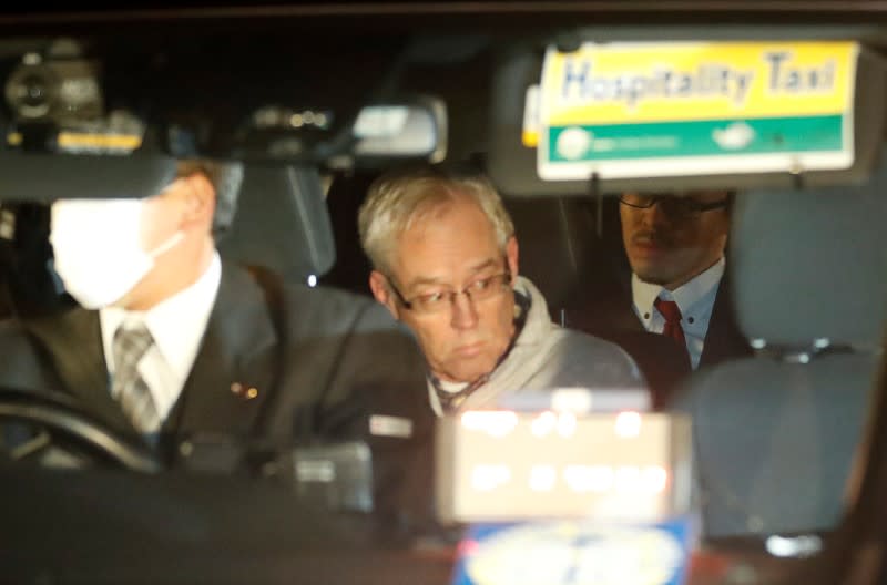 FILE PHOTO: Greg Kelly, the former deputy of ousted Nissan chairman Carlos Ghosn, is seen in the car, as he leaves after being released from a detention centre in Tokyo