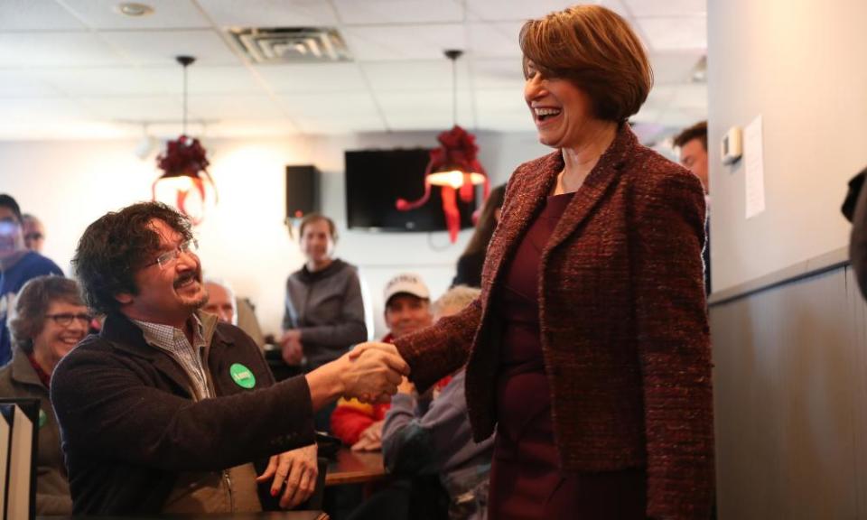 Amy Klobuchar greets people during a campaign stop in Estherville, Iowa, on 27 December 2019.