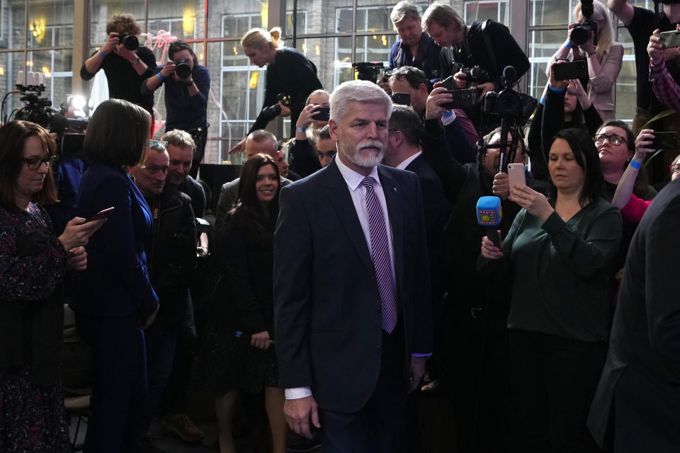 Presidential candidate Petr Pavel arrives to address media after announcement of the preliminary results for the first round of presidential election in Prague, Czech Republic, Saturday, Jan. 14, 2023. (AP Photo/Petr David Josek)