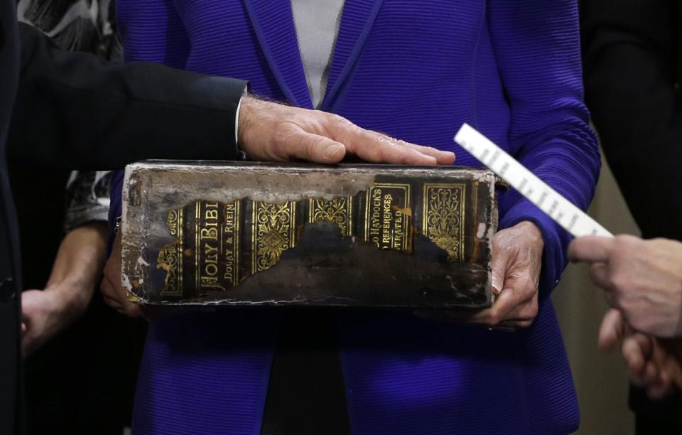 Vice President Joe Biden, left, places his hand on the Biden family Bible held by his wife, Jill Biden, center, as he takes the oath of office Jan. 20 in Washington, D.C.