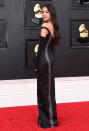 Sleek and sexy! The pop sensation wore a black off-the-shoulder gown by Vivienne Westwood at the Grammys. Her black gloves made her look even classier, and she stuck with a winged eyeliner look.