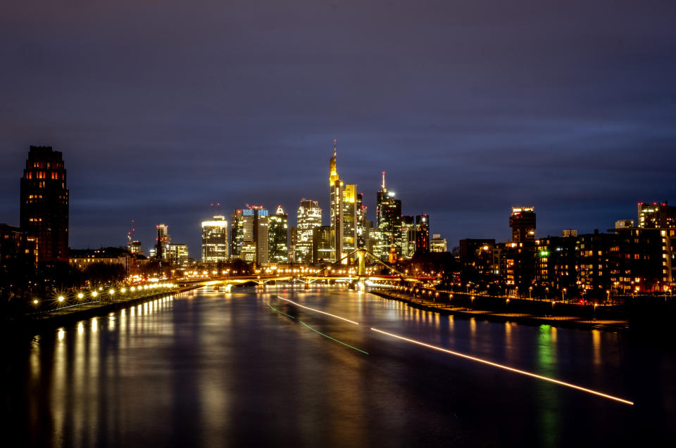 A cargo ship on the river Main in Frankfurt, Germany, Monday, March 22, 2021. German politics decides about further measures to avoid the outspread of the coronavirus on Monday. (AP Photo/Michael Probst)