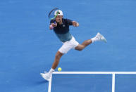 Tennis - Australian Open - Quarter-final - Melbourne Park, Melbourne, Australia, January 23, 2019. France's Lucas Pouille in action during the match against Canada's Milos Raonic. REUTERS/Aly Song