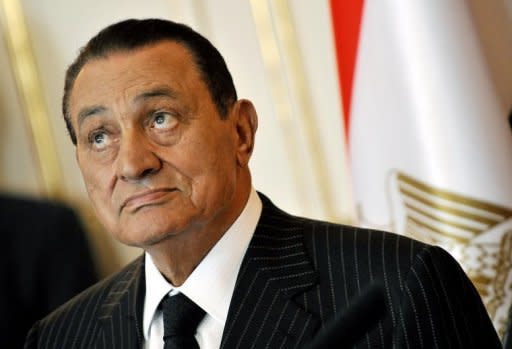 Egypt's ex-president Hosni Mubarak, pictured in 2009, was declared clinically dead after he was transferred to hospital from prison on Tuesday, state media reported, but a medical source said he was in a coma
