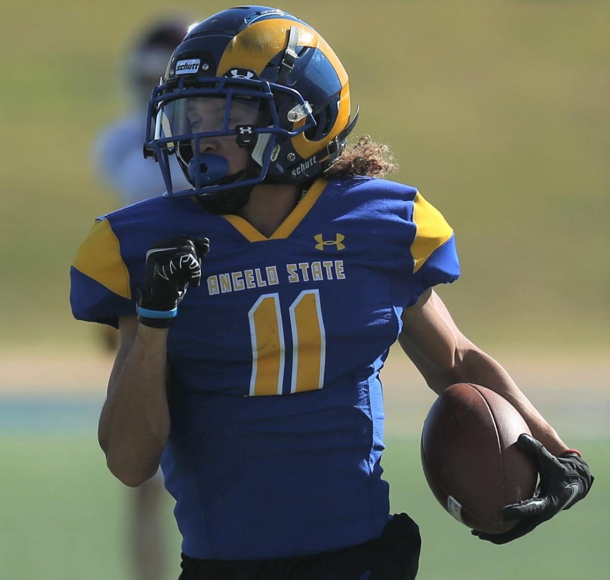 Angelo State University wide receiver Kellen Pachot heads to the end zone for a 78-yard touchdown during an NCAA Division II first-round playoff game against Minnesota-Duluth at LeGrand Stadium at 1st Community Credit Union Field on Saturday, Nov. 20, 2021.