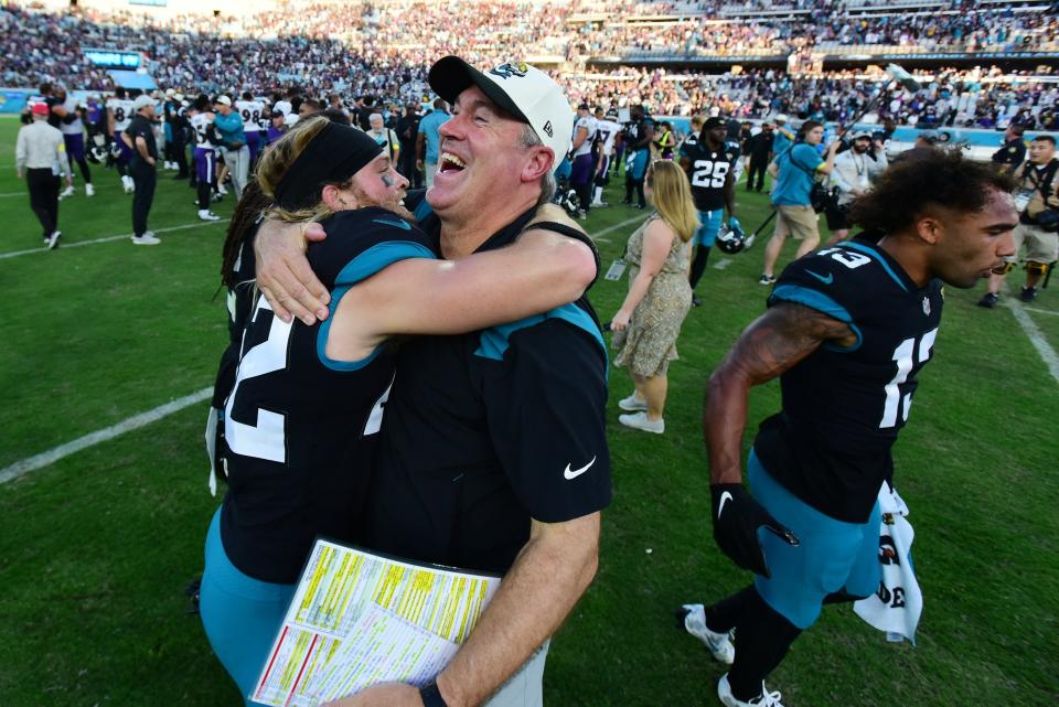 Jacksonville Jaguars head coach Doug Pederson celebrates with Jacksonville Jaguars safety Andrew Wingard (42) after Sunday's one point victory over the Ravens. The Jacksonville Jaguars hosted the Baltimore Ravens at TIAA Bank Field in Jacksonville, FL Sunday, November 27, 2022. The Jaguars got momentum late in the game to win 28 to 27 over the Ravens. [Bob Self/Florida Times-Union]