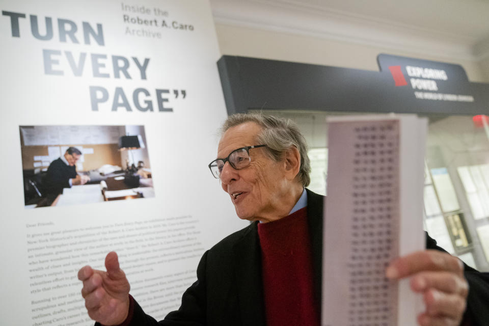 Author and biographer Robert Caro appears while touring a permanent exhibit in his honor, "Turn Every Page": Inside the Robert A. Caro Archive, at the New York Historical Society Museum & Library in New York on Wednesday, Oct. 20, 2021. (AP Photo/John Minchillo)