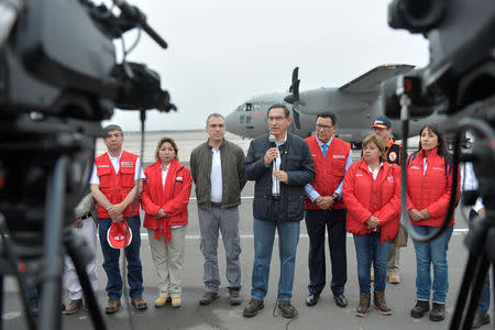 Peru's President Martin Vizcarra accompanied by members of his cabinet speaks to the media, before leaving for the area affected by earthquake, at the Jorge Chavez airport in Lima, Peru, May 26, 2019. Freddy Zarco/Courtesy of Bolivian Presidency/Handout via REUTERS
