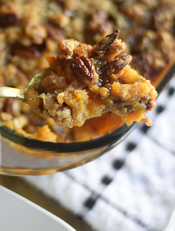 <p>My Pretty Brown Fit +Eats</p><p>This delicious sweet potato casserole is filled with sweet potatoes and fluffy marshmallows with a pecan-crusted topping. Truly food made for the soul and serves as the perfect side dish for the holidays and gatherings.</p><p><strong>Get the recipe: <a href="https://www.myprettybrownfit.com/sweet-potato-casserole-with-pecan-crusted-topping/" rel="nofollow noopener" target="_blank" data-ylk="slk:Sweet Potato Casserole with Pecan-Crusted Topping;elm:context_link;itc:0;sec:content-canvas" class="link rapid-noclick-resp">Sweet Potato Casserole with Pecan-Crusted Topping</a></strong></p>