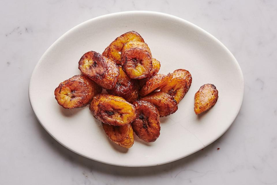 Caramelize ripe plantains to make maduros.