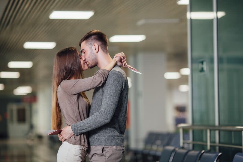 Kissing at the airport