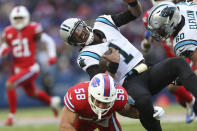 Carolina Panthers quarterback Cam Newton (1) is tackled on the run by Buffalo Bills outside linebacker Matt Milano (58) in the second half of an NFL football game, Sunday, Dec. 19, 2021, in Orchard Park, N.Y. (AP Photo/Joshua Bessex)