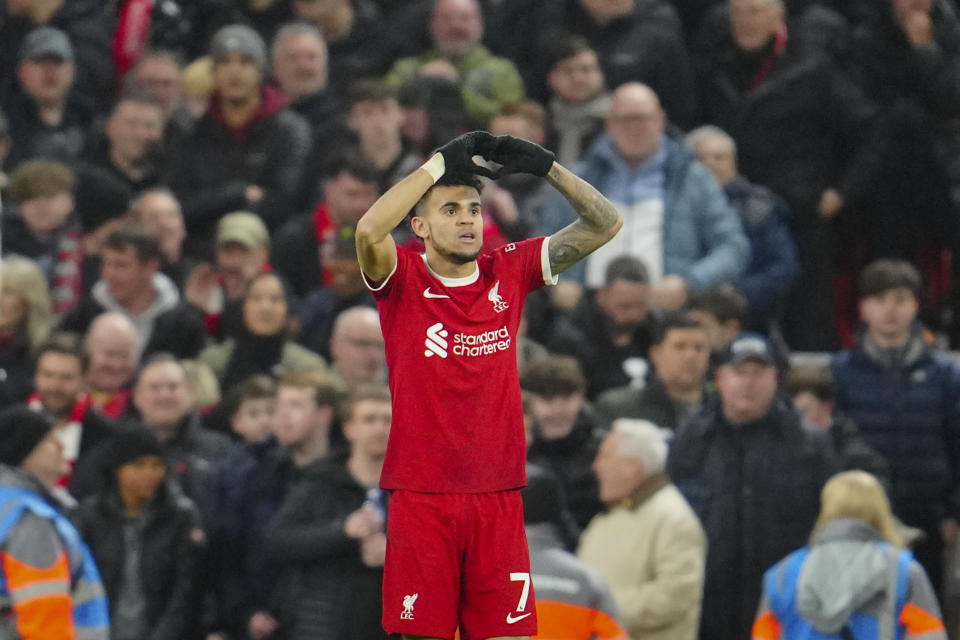 Liverpool's Luis Diaz celebrates after scoring his side's third goal during the English Premier League soccer match between Liverpool and Luton Town, at Anfield stadium in Liverpool, England, Wednesday, Feb. 21, 2024. (AP Photo/Jon Super)