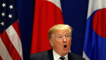 U.S. President Donald Trump speaks during a meeting with South Korean President Moon Jae-in and Japanese Prime Minister Shinzo Abe during the U.N. General Assembly in New York, U.S., September 21, 2017. REUTERS/Kevin Lamarque