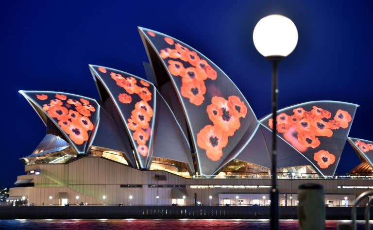 Sydney Opera House is lit up with poppies marking the centenary of the end of World War I