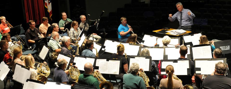 
Director Russ Mikkelson leads a rehearsal of the Heisey Wind Ensemble at the Reese Center.
