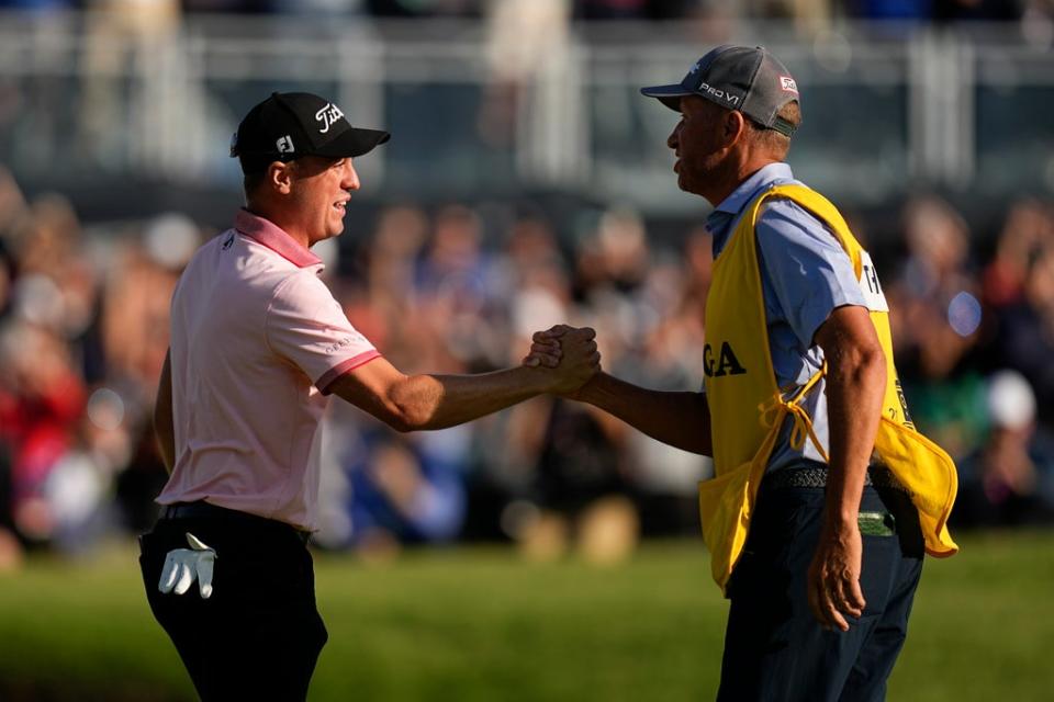 Justin Thomas celebrates with his caddie Jim “Bones” Mackay after winning the US PGA Championship (Eric Gay/AP) (AP)