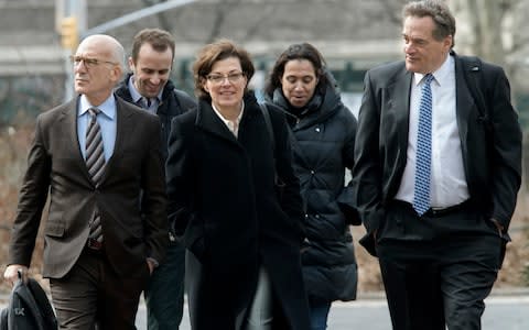 Nancy Salzman, center, arriving at Brooklyn federal court. - Credit: AP Photo/Mary Altaffer