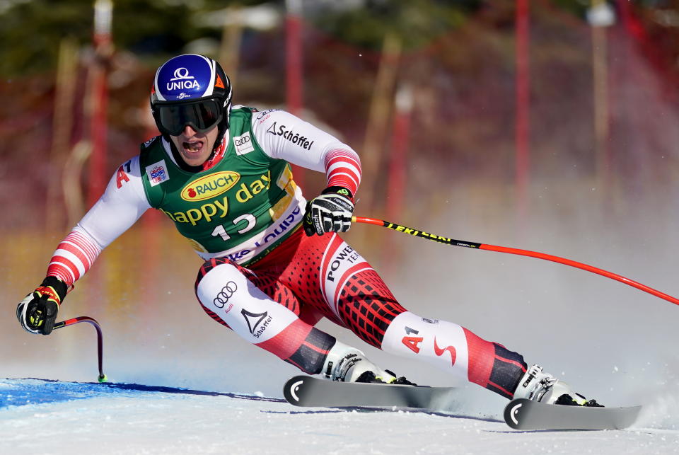 Matthias Mayer, of Austria, moves down the course during the men's World Cup downhill ski race in Lake Louise, Alberta, Sunday, Dec. 1, 2019. (Frank Gunn/The Canadian Press via AP)