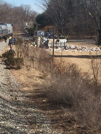 View of the scene following the accident when a train traveling from Washington to West Virginia carrying Republican members of the U.S. House of Representatives collided with a garbage truck, in Crozet, Virginia, U.S., January 31, 2018, in this picture obtained from social media. Congressman Greg Walden/via REUTERS